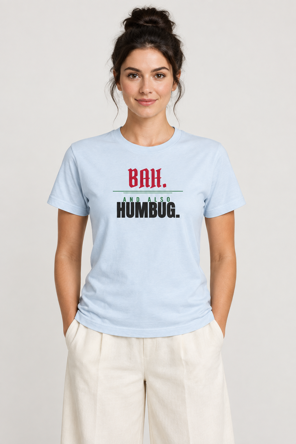 Woman with a dark high bun in the blue fog Bah and Also Humbug tee