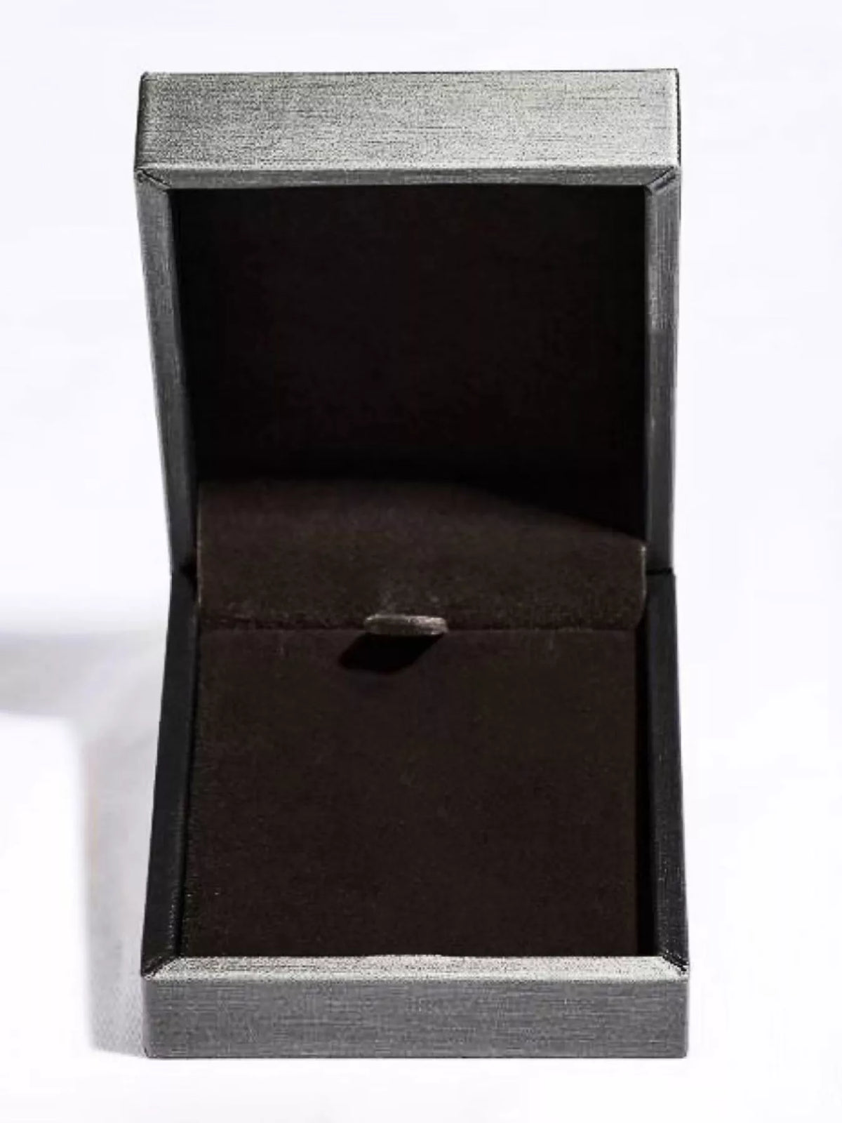 Black jewelry box with a silver clasp on a white background