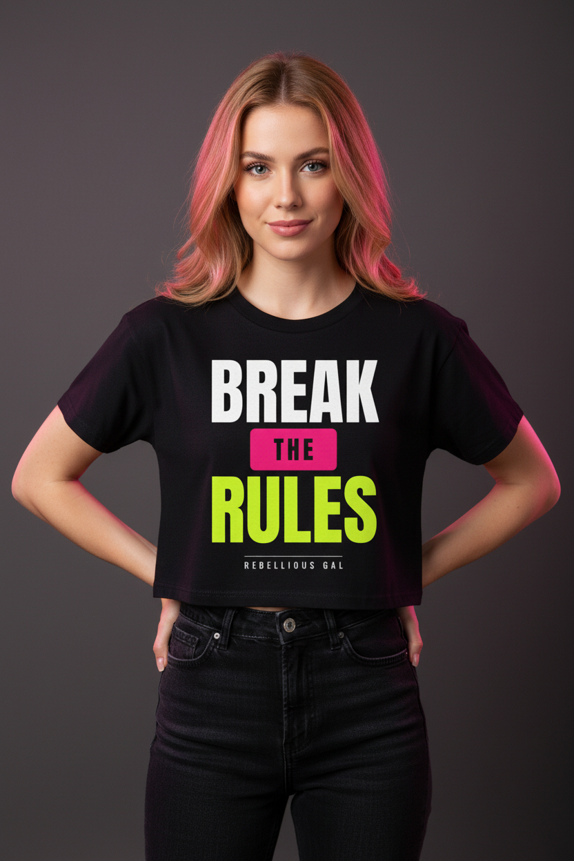 Strawberry blonde woman in the black Break the Rules boxy crop top with black jeans