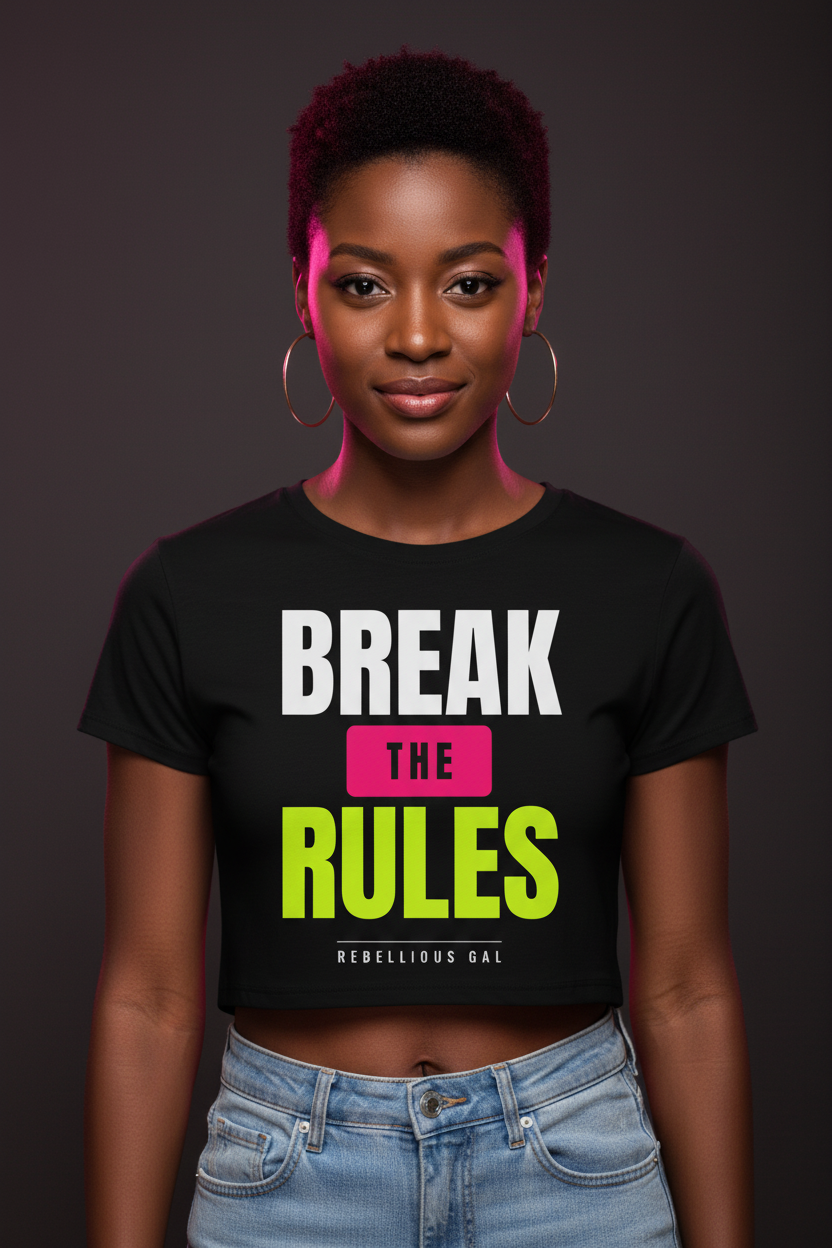 Pixie-cut woman with gold hoops in the black Break the Rules fitted crop tee and jeans