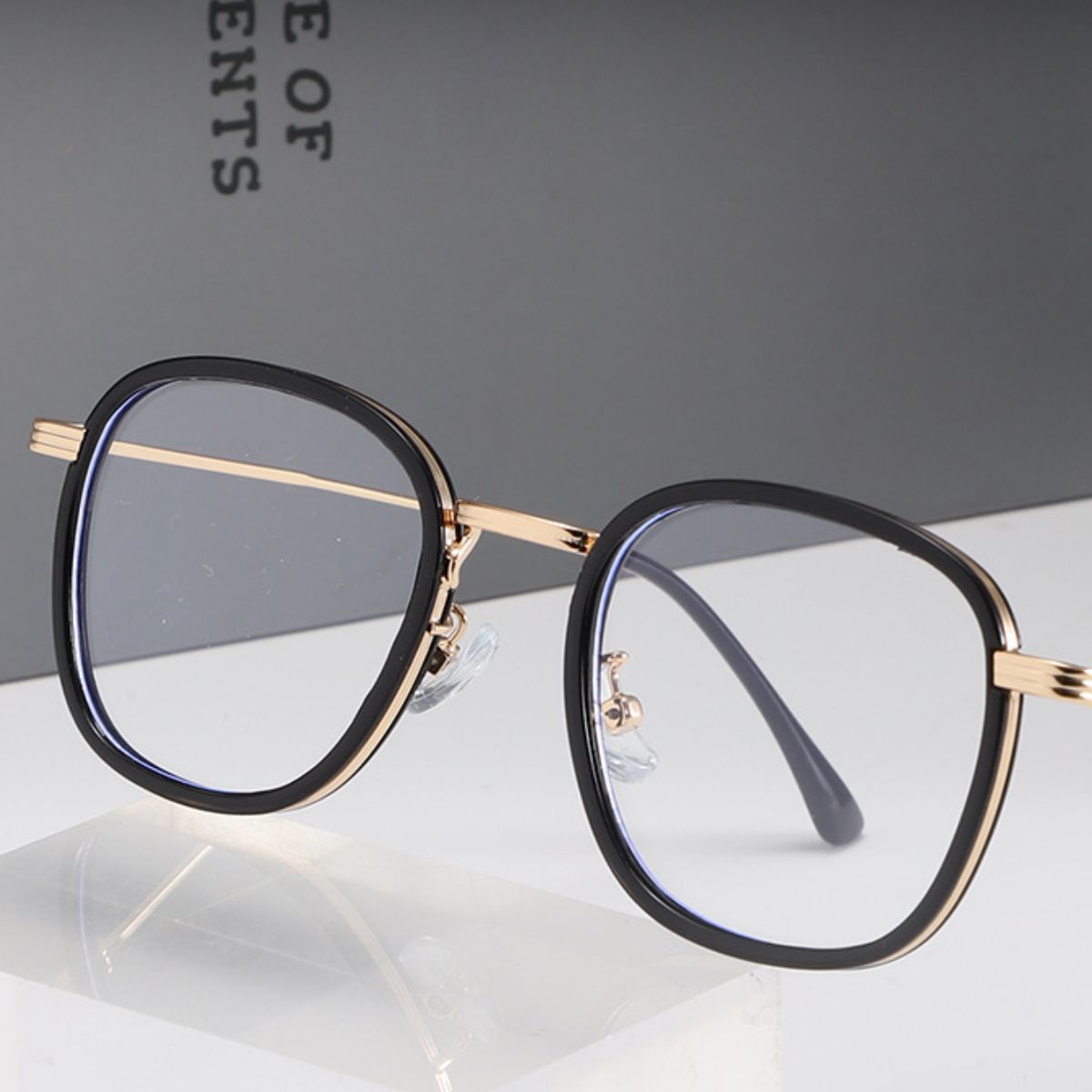 Close-up of hybrid metal plastic frame glasses detail