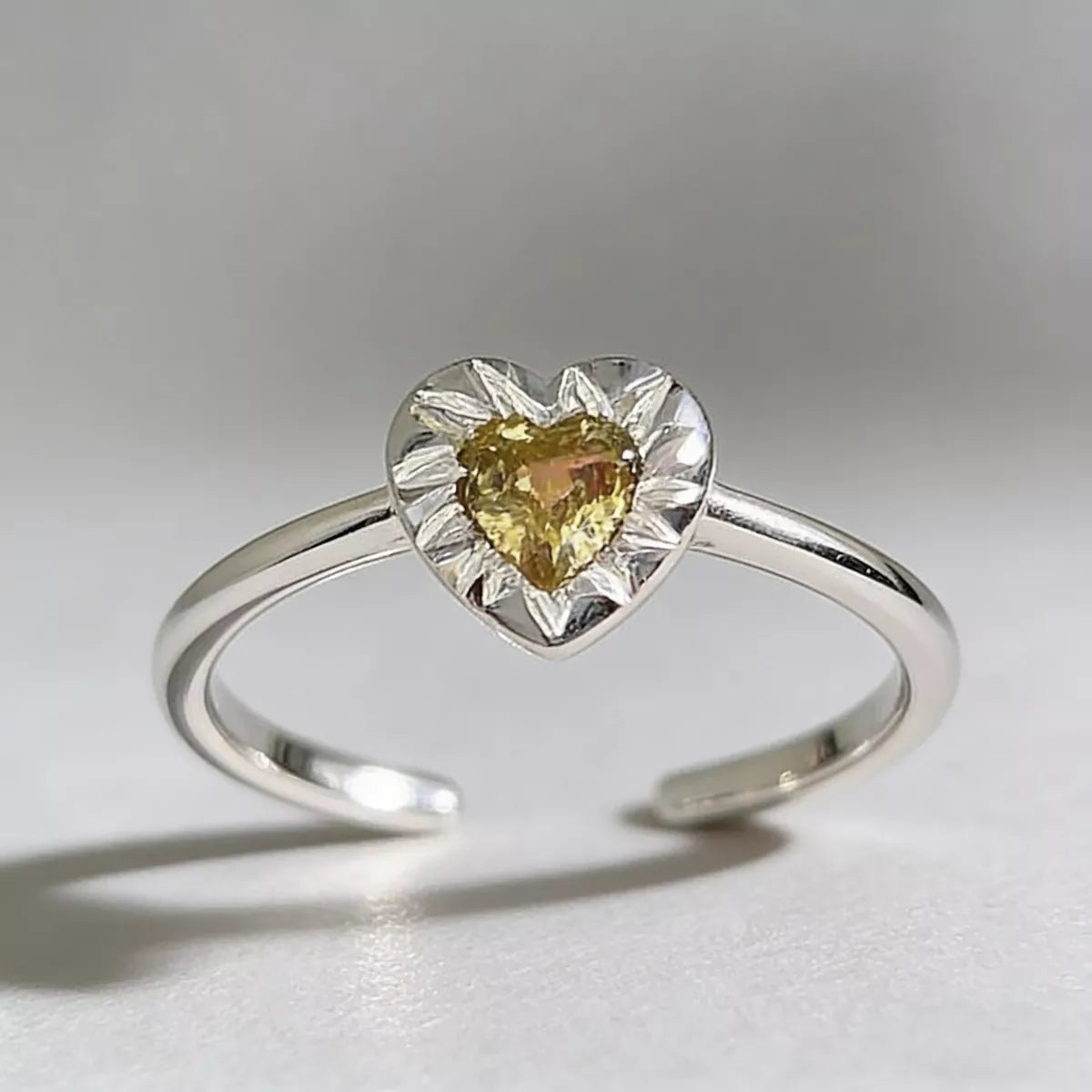 Close-up texture of polished 925 sterling silver and zircon sparkle