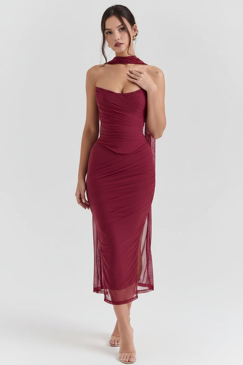 Red one-shoulder dress with a white background