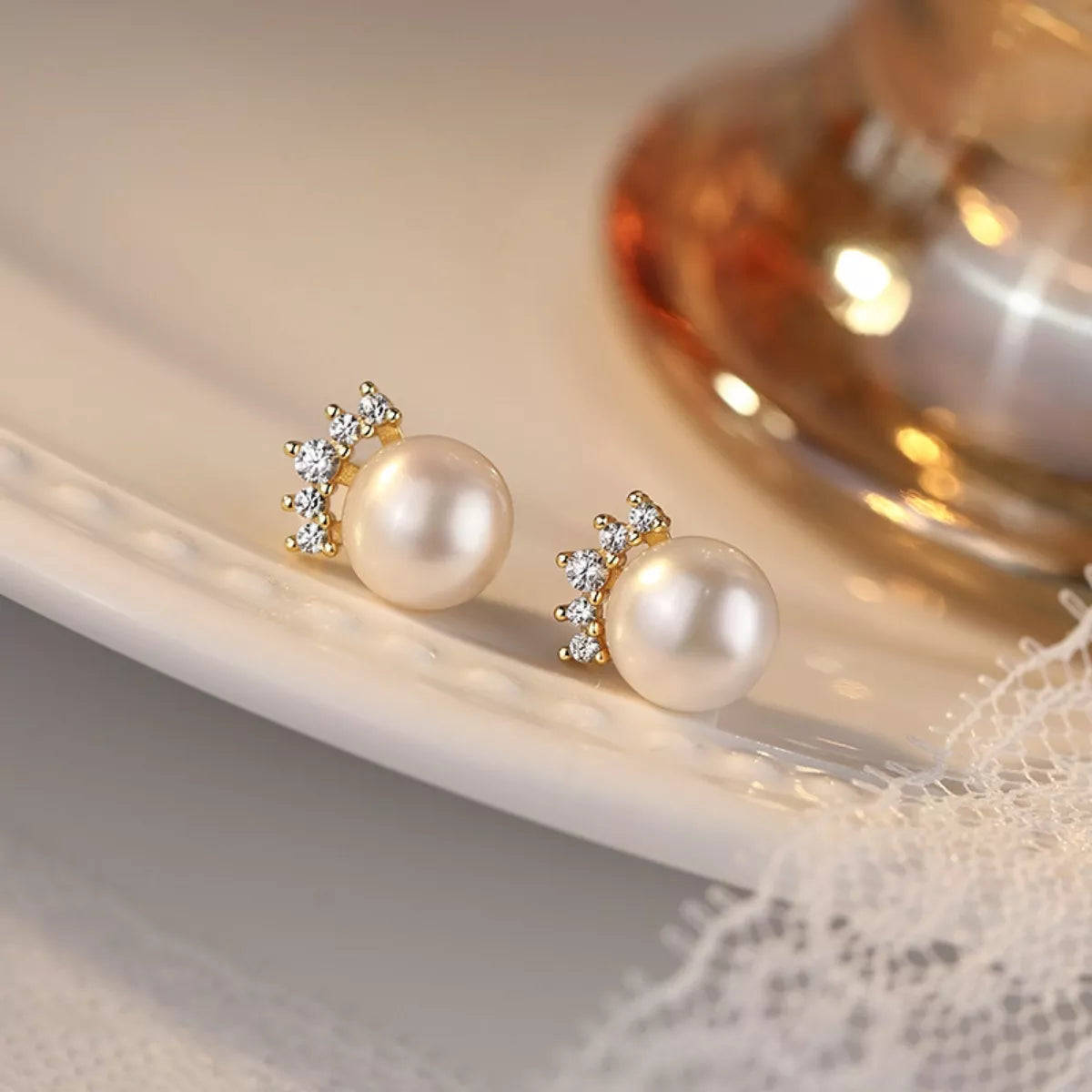 Rebellious Gal freshwater pearl earrings with zircon sparkle studio lighting shot