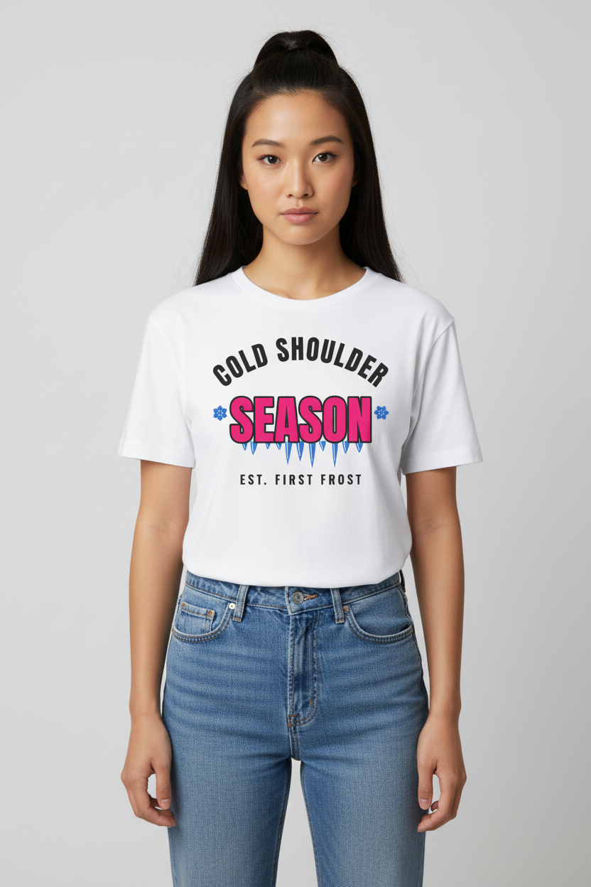 Woman with a long ponytail in the white Cold Shoulder Season tee, studio backdrop