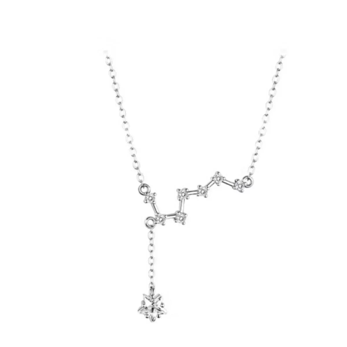 Rebellious woman wearing celestial star pendant necklace lifestyle shot white background