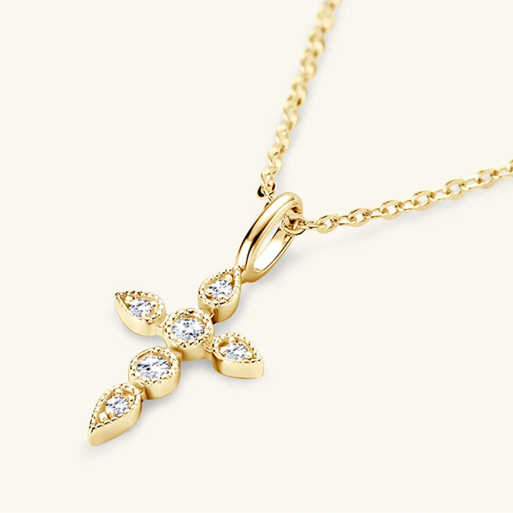 Side profile of delicate cross necklace showing 15.7" chain and 2" extension