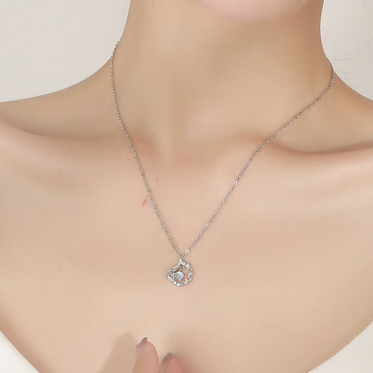 Close-up of sparkling zircon stone set in 925 sterling silver pendant