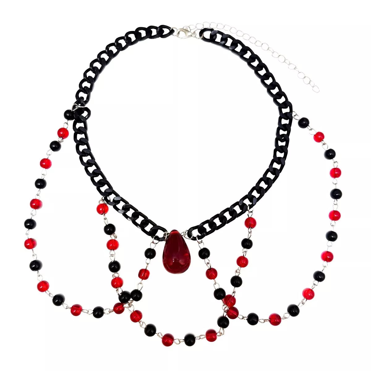 Double-strand red and black beaded choker with a red teardrop pendant, flat lay on white