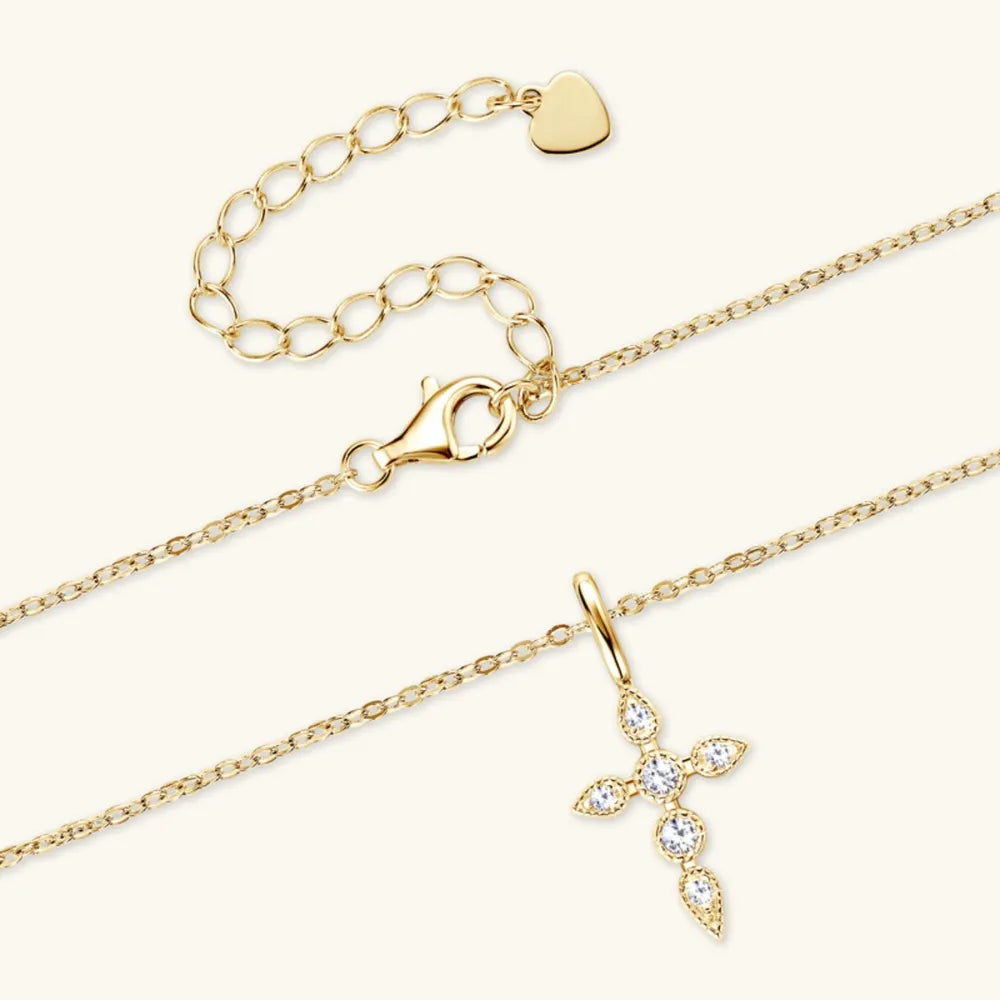 Detail shot of excellent cut moissanite sparkle and polished sterling silver cross