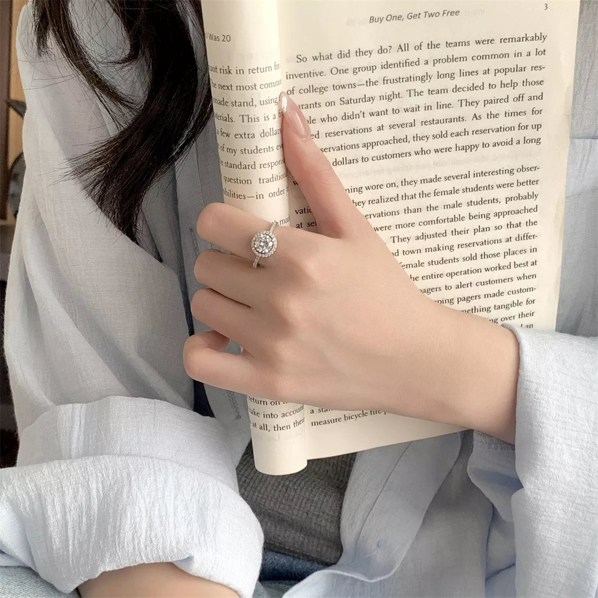 Close-up of brilliant 1CT moissanite stone in platinum-plated sterling silver setting