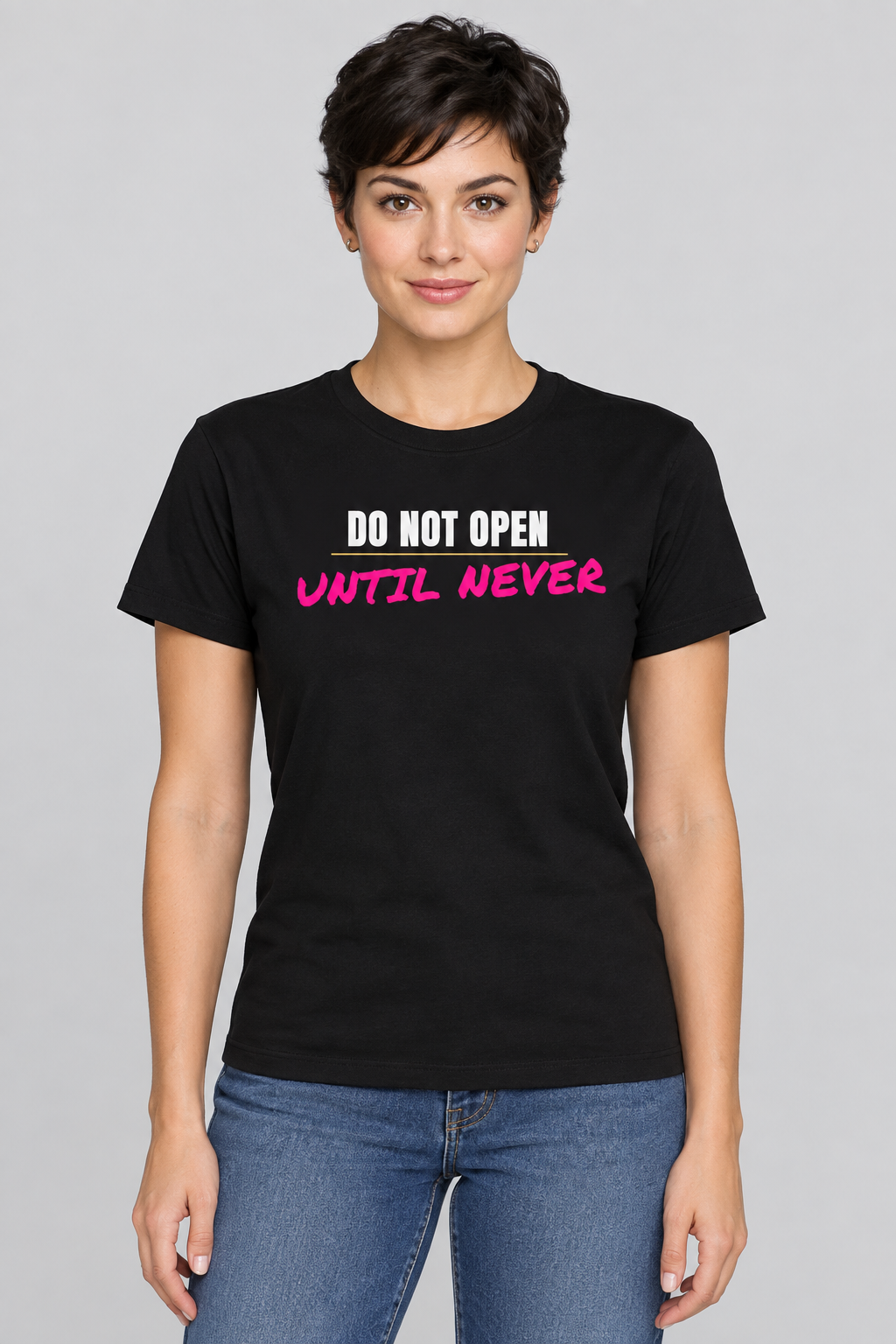 Woman with a dark pixie cut in the black Do Not Open Until Never tee, studio