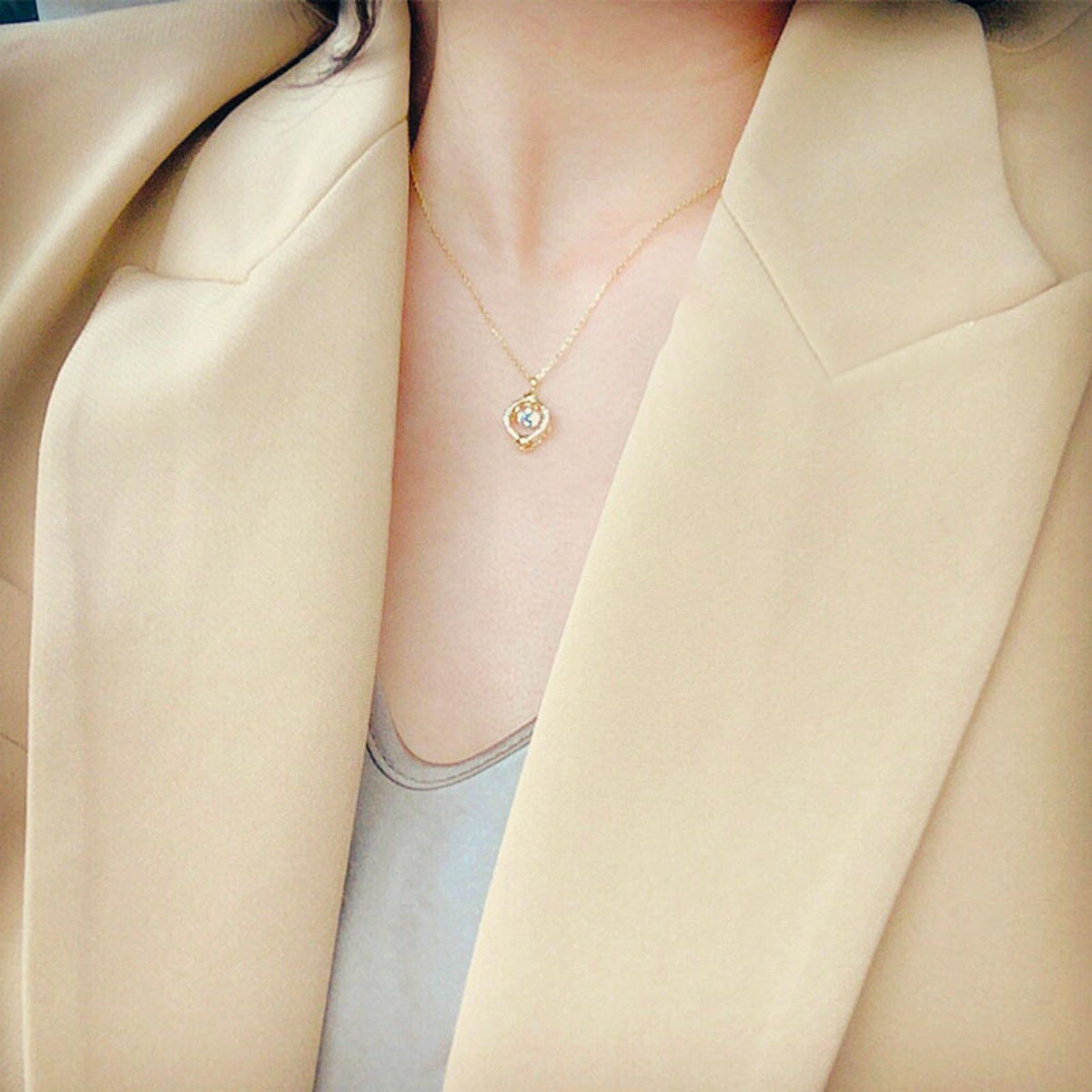 Lifestyle image of necklace paired with casual outfit