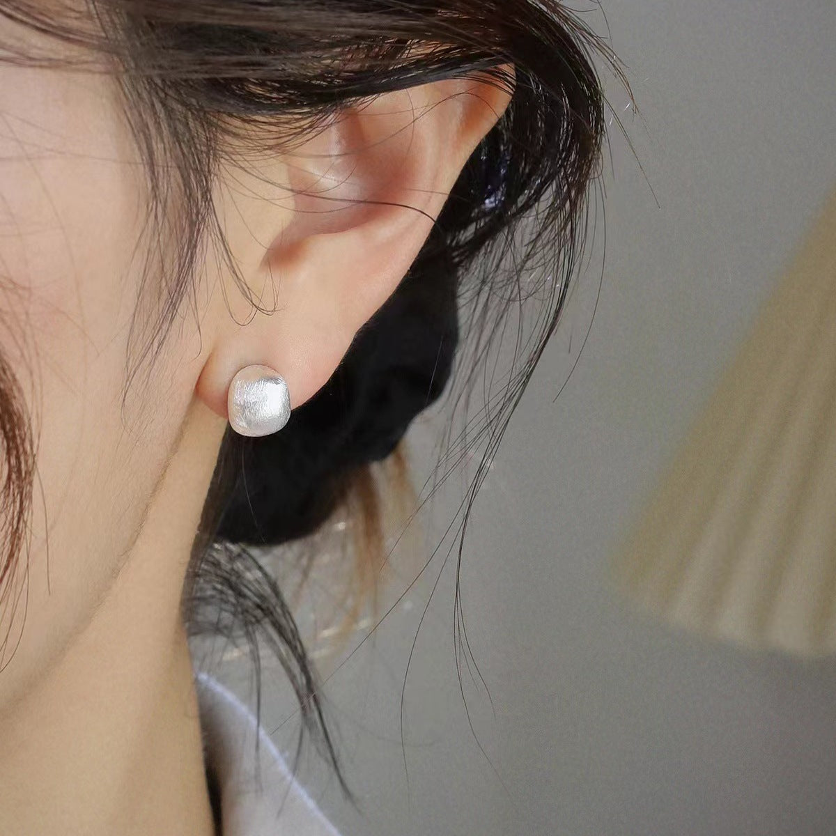 Close-up of 925 Sterling Silver C-Hoop Earrings