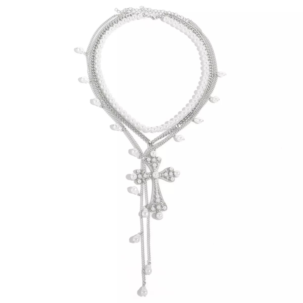 Silver bracelet with a cross charm on a white background