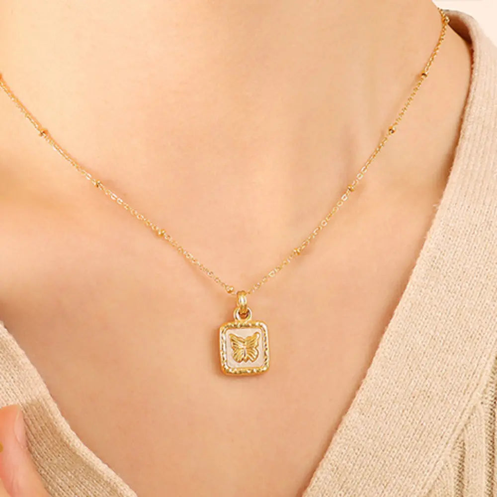 Stainless steel heart necklace gold plated on rebellious woman neck 2026