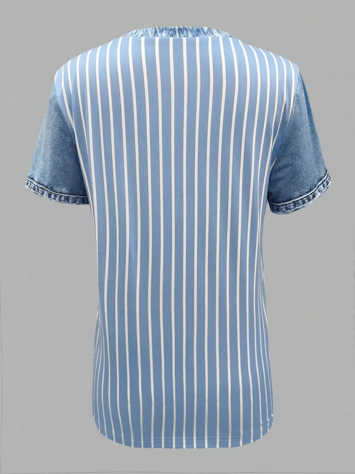 Blue and white striped shirt on a gray background