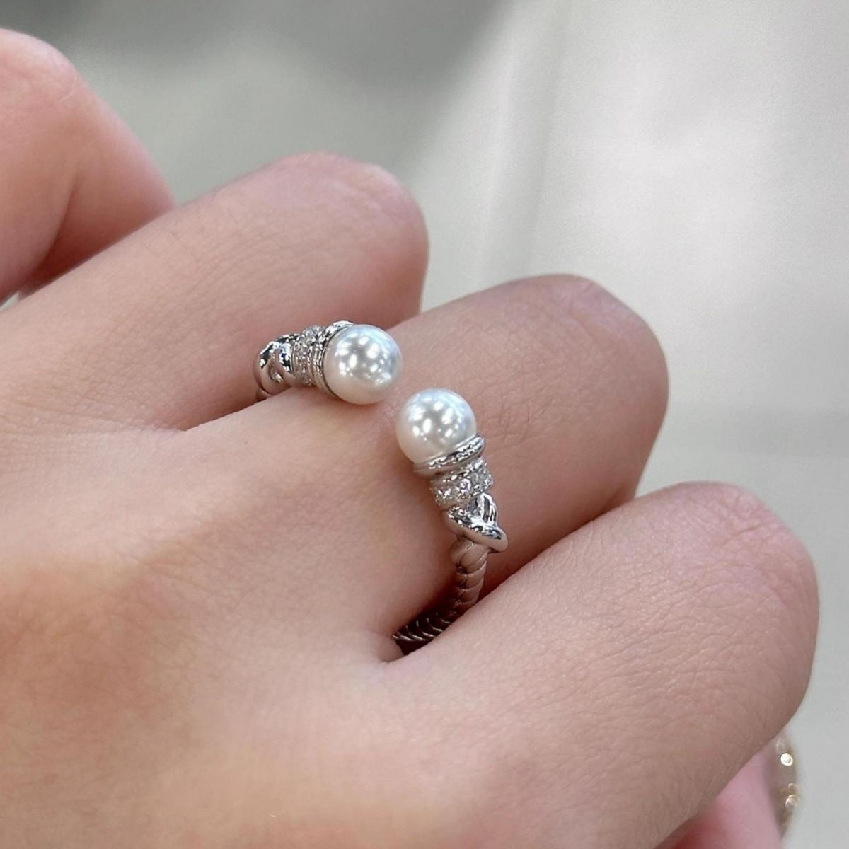 rebellious gal pearl ring close up detail