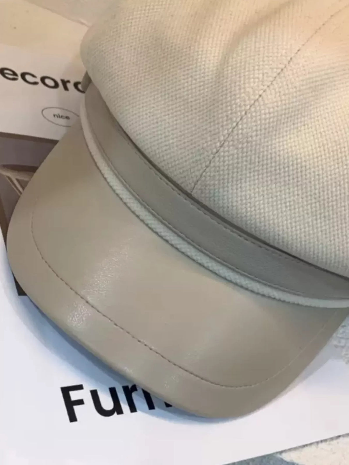 Rebellious Gal model wearing solid color cap with edgy casual outfit attitude