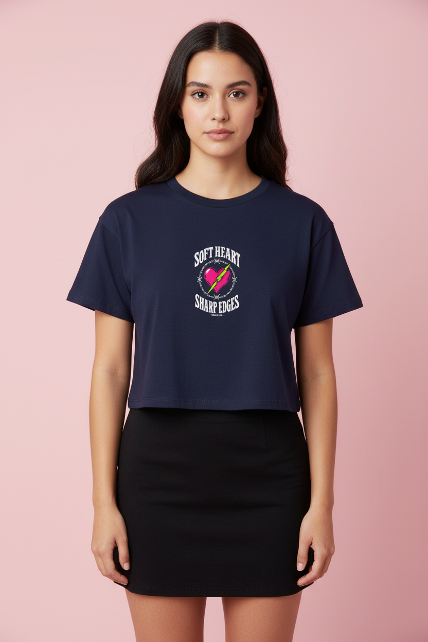 Woman with long dark hair in the navy Soft Heart Sharp Edges boxy crop top