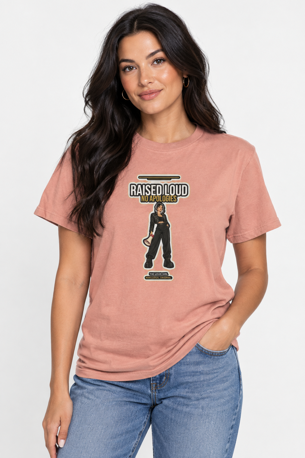 Woman with long dark hair in the dusty rose Loud Girl graphic tee