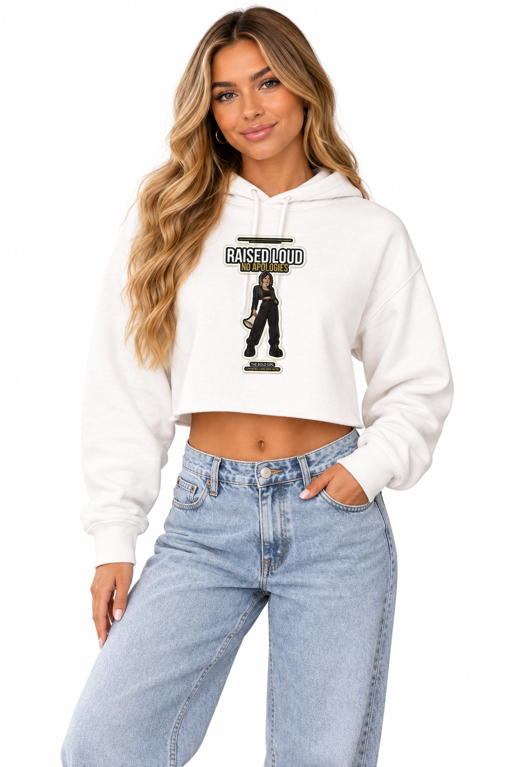 Blonde woman in the blush lightweight crop hoodie with the Raised Loud No Apologies print